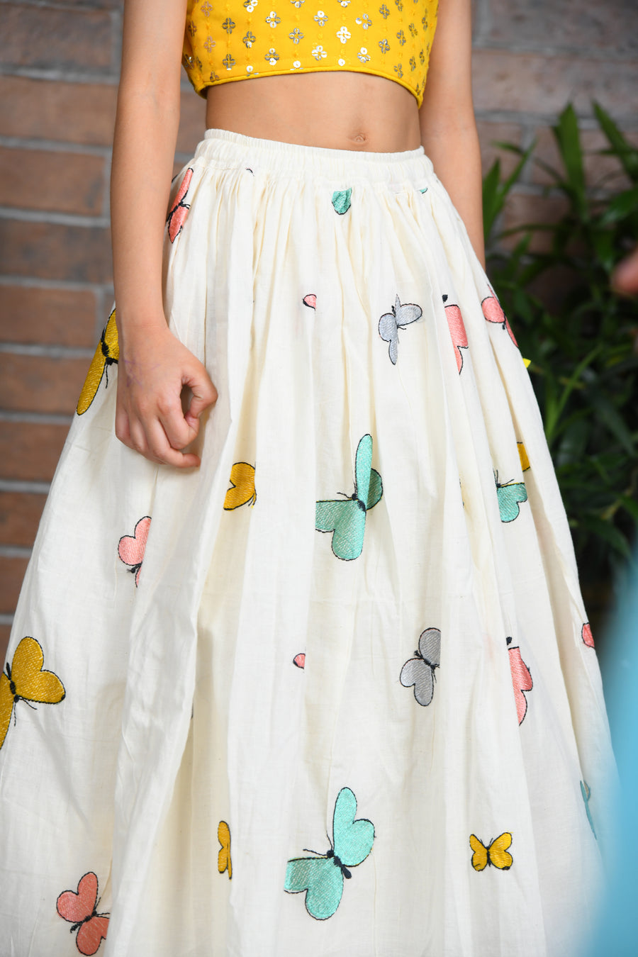 off white butterfly embroidered skirt with sequin embroidered top