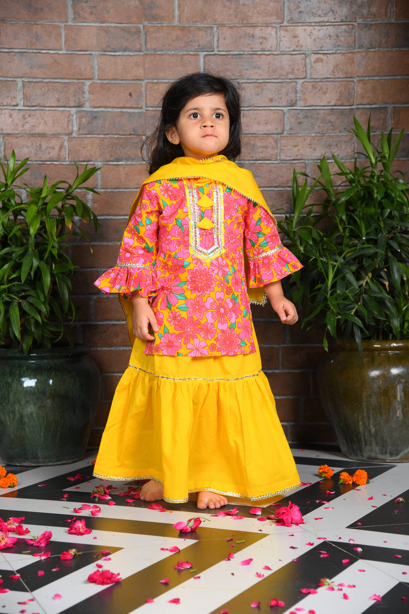 pink floral kurta with yellow lengha and chunni