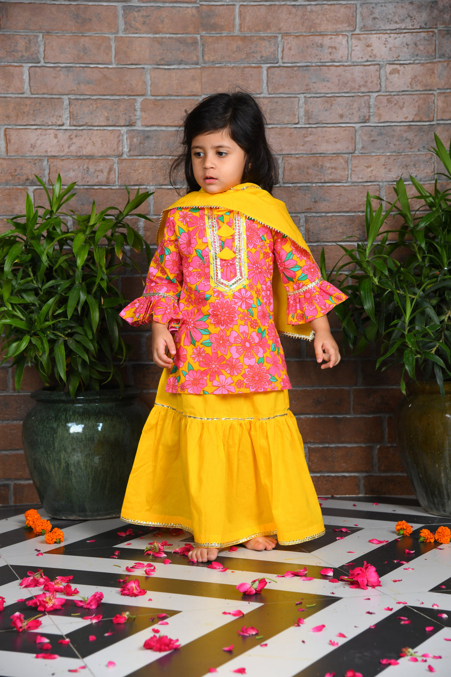 pink floral kurta with yellow lengha and chunni