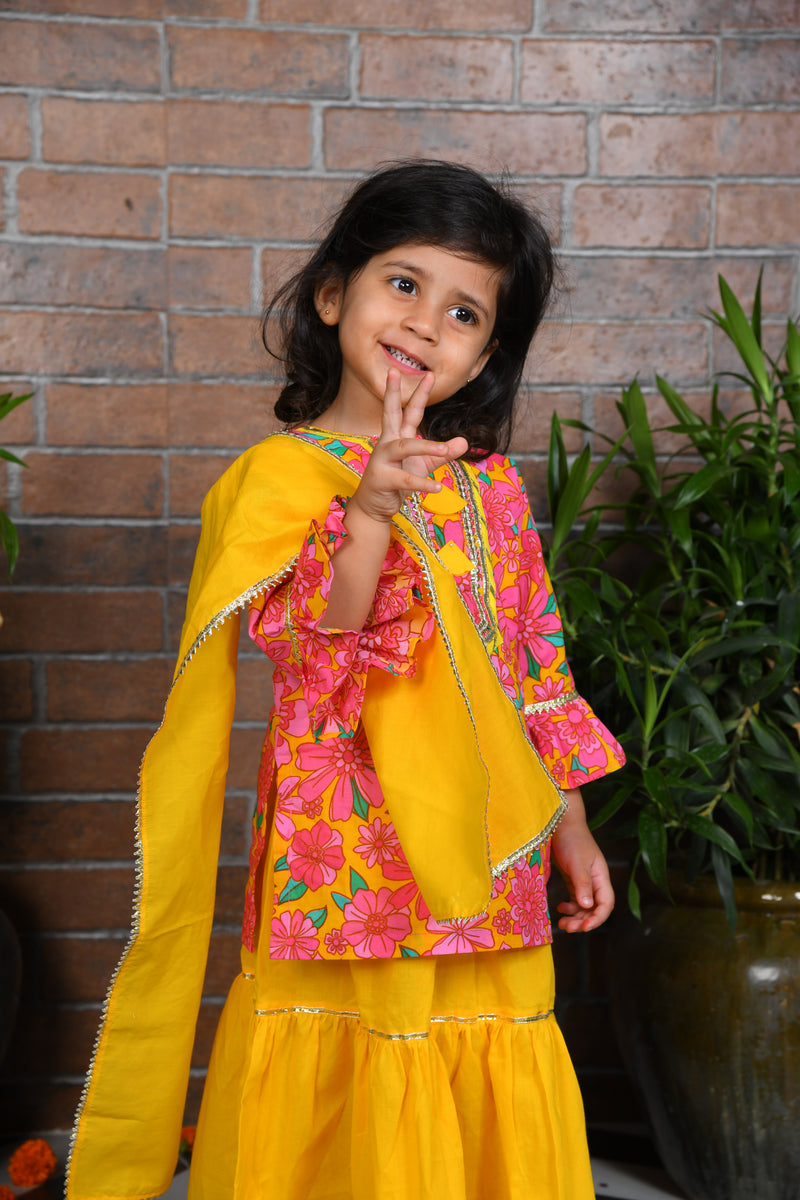 pink floral kurta with yellow lengha and chunni