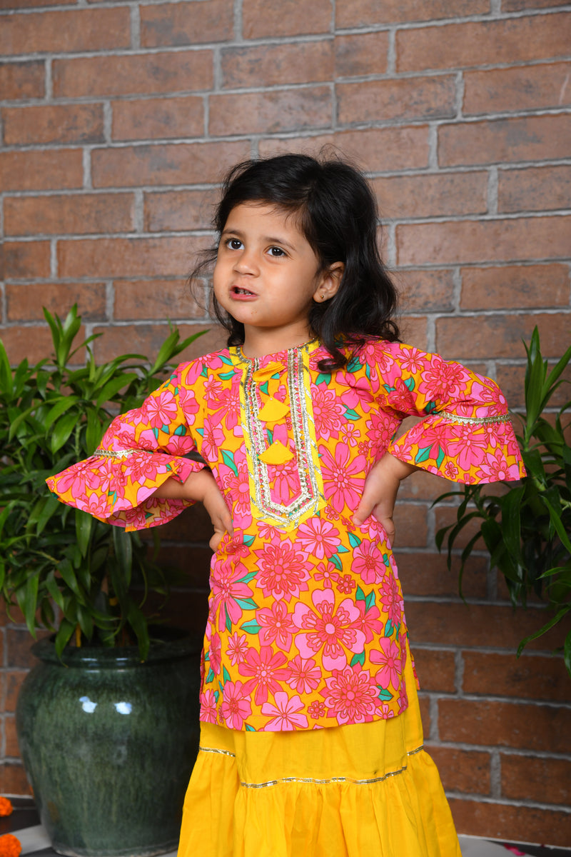 pink floral kurta with yellow lengha and chunni