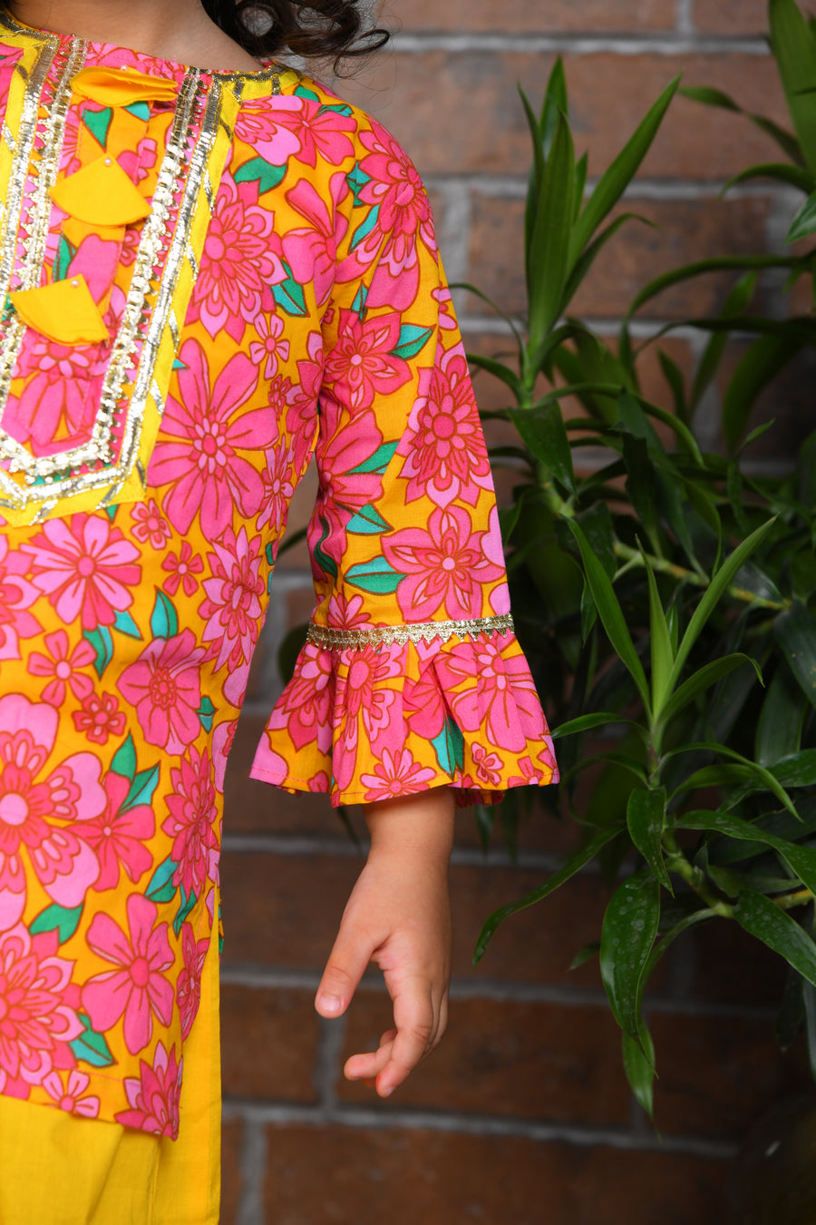 pink floral kurta with yellow lengha and chunni